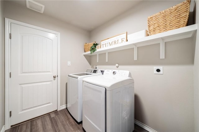 1142 Breebry Dr, Corpus Christi, TX 78415 - washroom with dark wood-style floors and independent washer and dryer