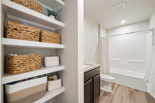 1142 Breebry Dr, Corpus Christi, TX 78415 - bathroom with wood finished floors, shower / bath combination with curtain, vanity, and recessed lighting