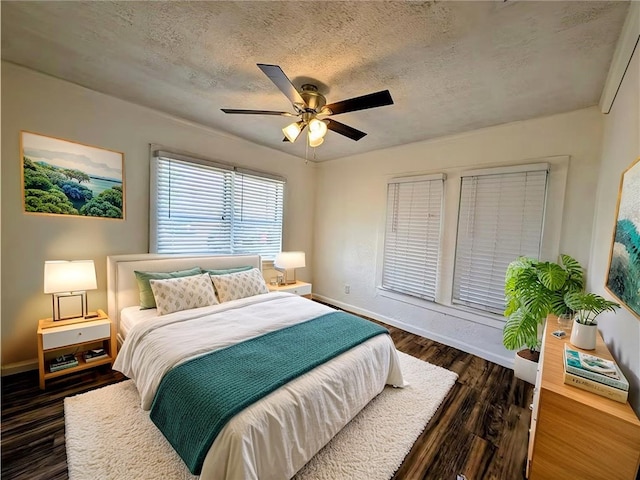 2853 Lawnview St, Corpus Christi, TX 78404 - bedroom featuring a textured ceiling, dark wood-style floors, and a ceiling fan