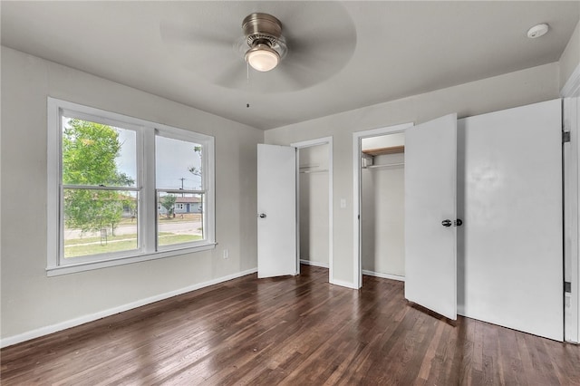 130 N Houston St, Aransas Pass, TX 78336 - unfurnished bedroom with ceiling fan, baseboards, and wood finished floors