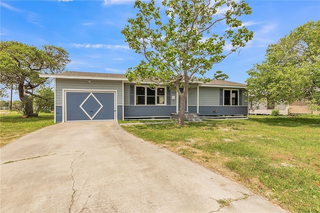 130 N Houston St, Aransas Pass, TX 78336 - ranch-style house featuring concrete driveway, an attached garage, and a front yard