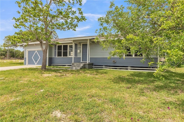 130 N Houston St, Aransas Pass, TX 78336 - ranch-style home with concrete driveway, a front yard, and a garage
