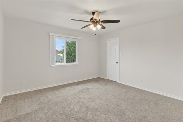 7821 Kingshire Dr, Corpus Christi, TX 78413 - spare room with carpet flooring and ceiling fan