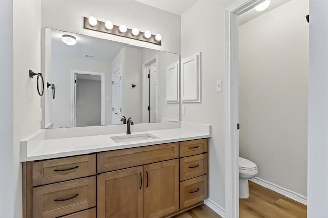 7821 Kingshire Dr, Corpus Christi, TX 78413 - bathroom featuring vanity and wood finished floors