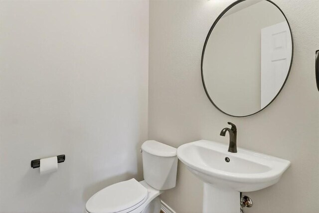 7821 Kingshire Dr, Corpus Christi, TX 78413 - half bath with toilet and a sink