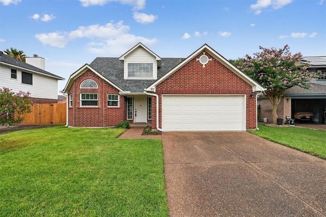 7821 Kingshire Dr, Corpus Christi, TX 78413 - traditional-style house featuring brick siding, driveway, a garage, and a shingled roof