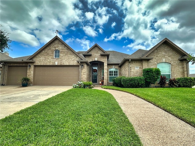 french country inspired facade with a garage and a front lawn