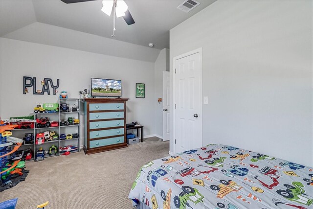 carpeted bedroom with lofted ceiling and ceiling fan