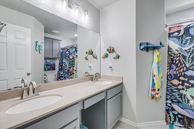 bathroom featuring walk in shower, vanity, and toilet