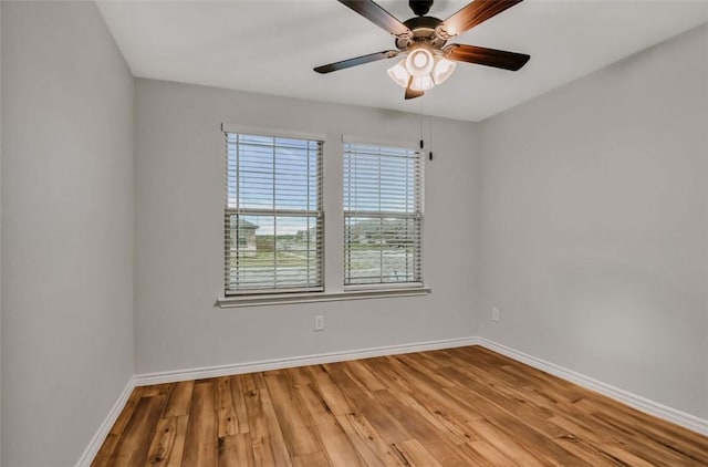 7602 Bayley Ln, Corpus Christi, TX 78414 - spare room with wood finished floors, baseboards, and ceiling fan