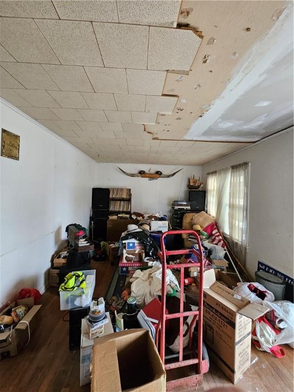 miscellaneous room with wood-type flooring