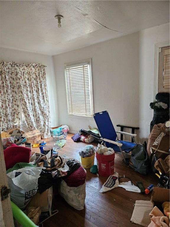 miscellaneous room with dark hardwood / wood-style flooring