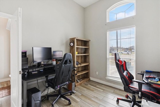 office area with light wood-type flooring