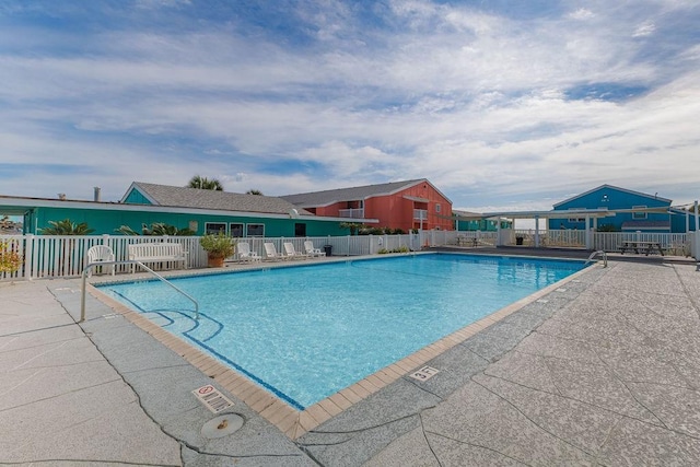 view of swimming pool featuring a patio