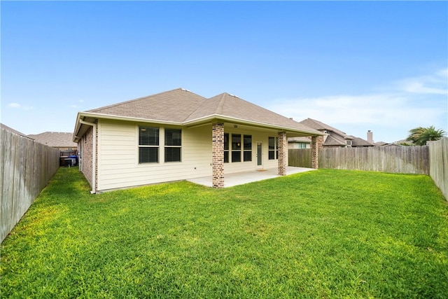 2538 Las Estrellas St, Corpus Christi, TX 78414 - back of house with a patio, brick siding, and roof with shingles
