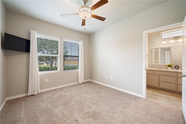 2538 Las Estrellas St, Corpus Christi, TX 78414 - unfurnished bedroom with light colored carpet, baseboards, and ensuite bathroom