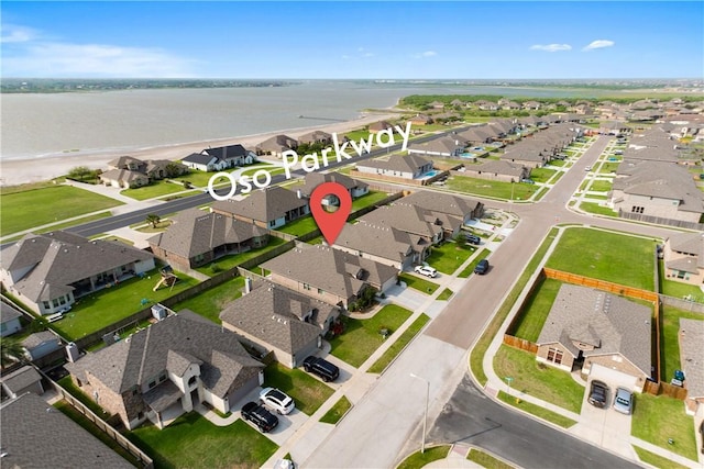 2538 Las Estrellas St, Corpus Christi, TX 78414 - aerial perspective of suburban area with a large body of water