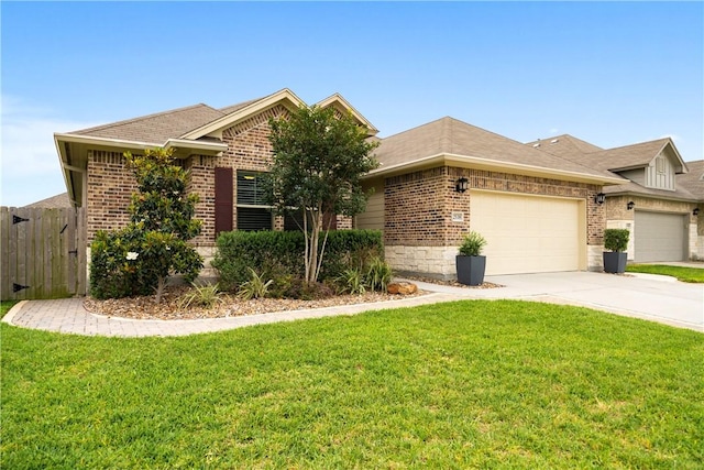 2538 Las Estrellas St, Corpus Christi, TX 78414 - view of front facade with brick siding, an attached garage, and concrete driveway