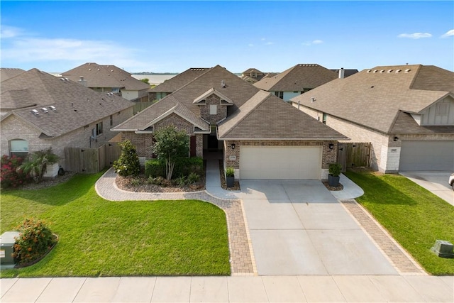 2538 Las Estrellas St, Corpus Christi, TX 78414 - view of front of house featuring brick siding, a garage, roof with shingles, driveway, and a residential view