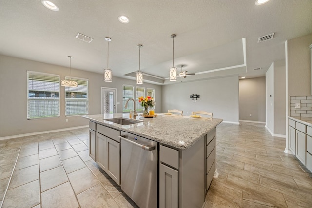 2538 Las Estrellas St, Corpus Christi, TX 78414 - kitchen featuring a sink, dishwasher, a raised ceiling, baseboards, and recessed lighting