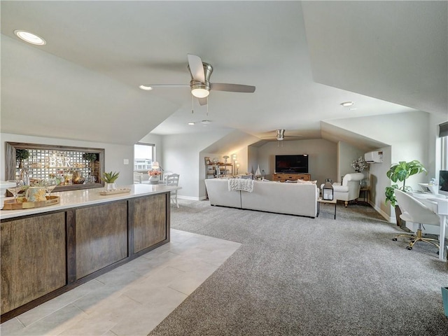 interior space featuring lofted ceiling, ceiling fan, light colored carpet, baseboards, and an AC wall unit