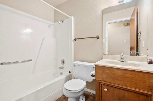 full bathroom with toilet, vanity, and shower / bath combination