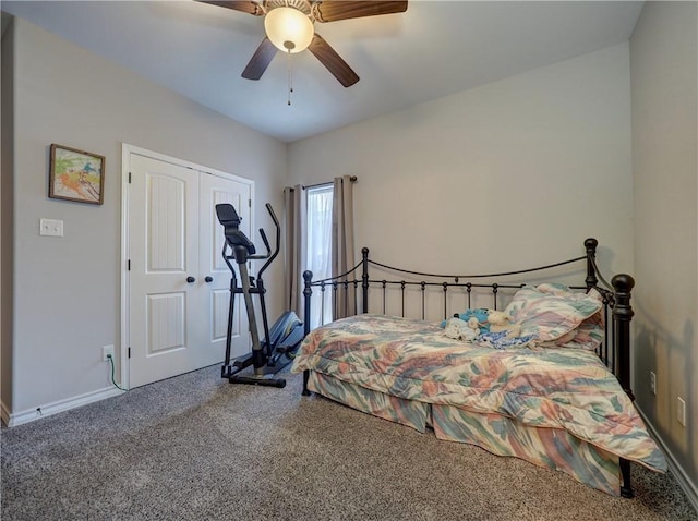 bedroom with ceiling fan, a closet, and carpet