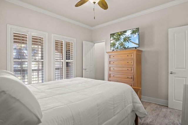 bedroom with ceiling fan, light hardwood / wood-style flooring, and ornamental molding