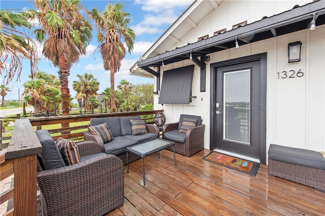 deck with an outdoor living space