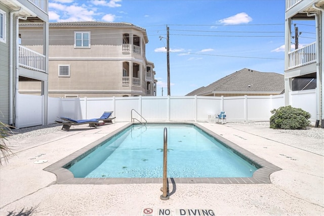 view of pool with a patio area