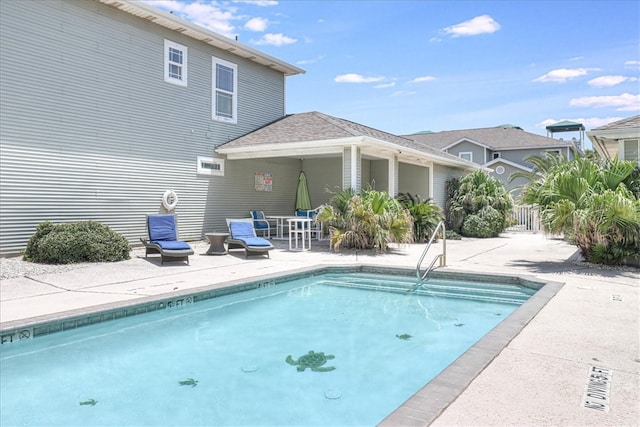 view of pool with a patio