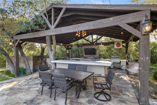 view of patio / terrace featuring area for grilling and a gazebo