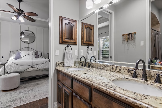 bathroom featuring hardwood / wood-style flooring and vanity