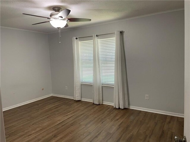 4513 Snead Dr, Corpus Christi, TX 78413 - spare room with dark wood-style floors, ornamental molding, a ceiling fan, a textured ceiling, and baseboards