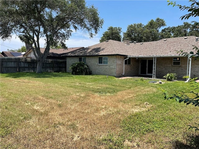 4513 Snead Dr, Corpus Christi, TX 78413 - back of property with brick siding and a shingled roof