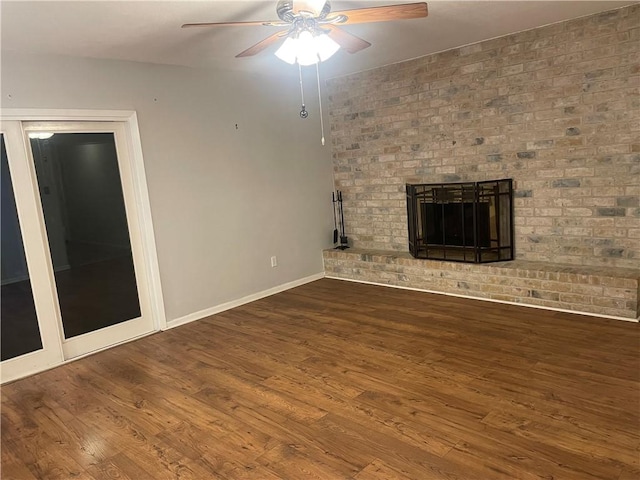 4513 Snead Dr, Corpus Christi, TX 78413 - unfurnished living room with ceiling fan, a fireplace, wood finished floors, and baseboards