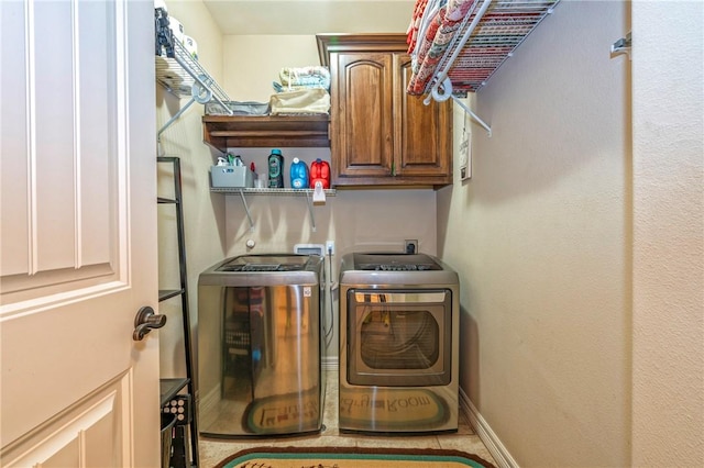 3918 Willow Heights Dr, Corpus Christi, TX 78410 - laundry room featuring washer and dryer and cabinet space