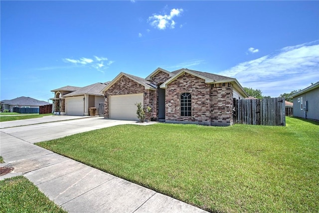 3918 Willow Heights Dr, Corpus Christi, TX 78410 - ranch-style home featuring an attached garage, brick siding, and driveway