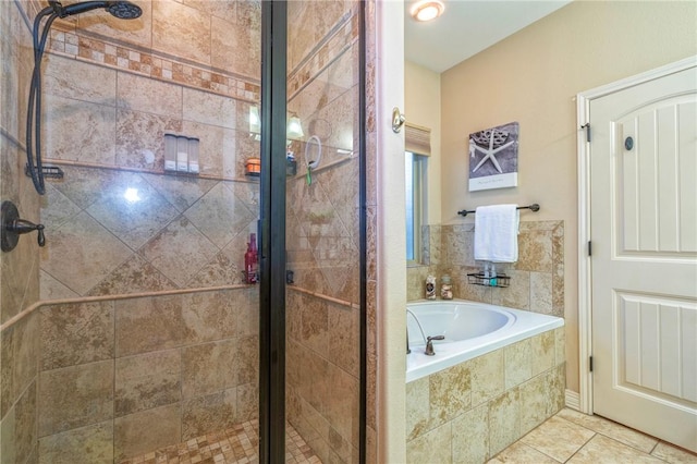 3918 Willow Heights Dr, Corpus Christi, TX 78410 - full bathroom with a stall shower, a garden tub, and tile patterned flooring