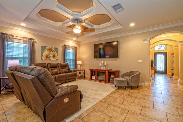 3918 Willow Heights Dr, Corpus Christi, TX 78410 - living area with arched walkways, plenty of natural light, ornamental molding, ceiling fan, and ornate columns