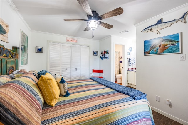 bedroom featuring ceiling fan, dark hardwood / wood-style floors, ensuite bathroom, crown molding, and a closet