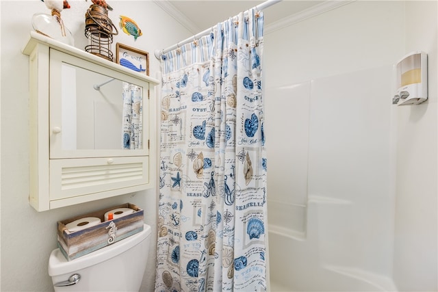 bathroom with toilet, curtained shower, and ornamental molding