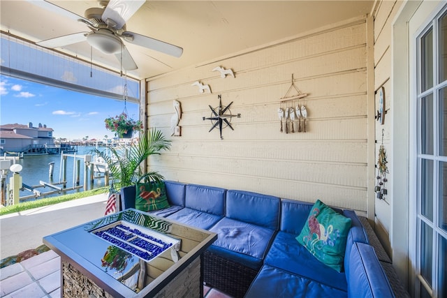 view of patio featuring a water view