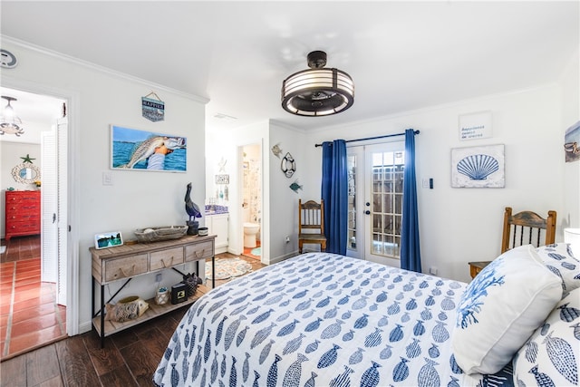 bedroom featuring ensuite bath, access to exterior, french doors, dark hardwood / wood-style floors, and crown molding