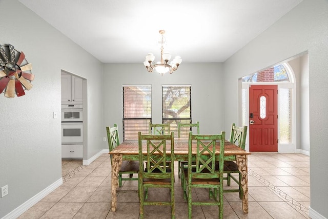2214 N Mccampbell St, Aransas Pass, TX 78336 - dining area with plenty of natural light, a chandelier, and light tile patterned floors
