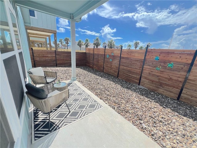 1931 Eskridge St, Port Aransas, TX 78373 - fenced backyard featuring a patio area