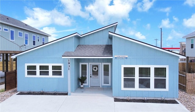 1931 Eskridge St, Port Aransas, TX 78373 - view of front of house featuring roof with shingles
