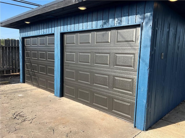 garage featuring fence