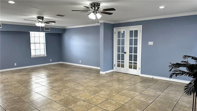 spare room featuring ceiling fan, visible vents, baseboards, ornamental molding, and french doors