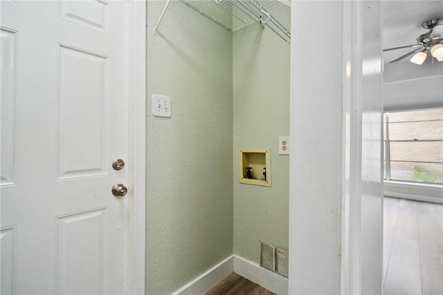 washroom featuring hookup for a washing machine, ceiling fan, and wood-type flooring